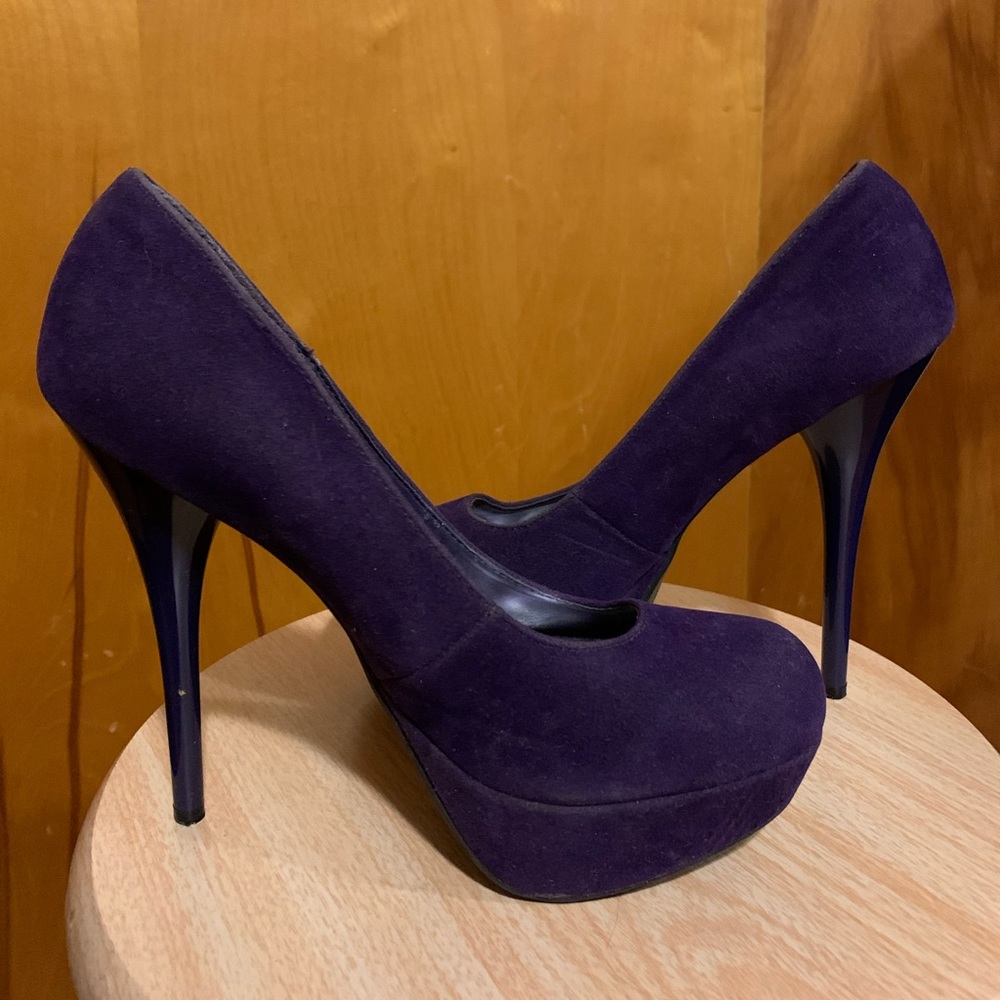 Purple suede pumps